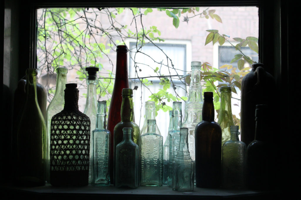 8 easy ways to repurpose glass bottles Hello Homestead