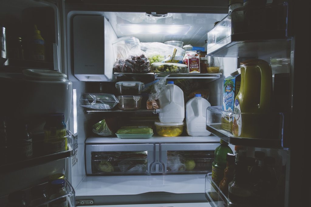 Photo of the inside of an refrigerator that is crammed with food. Image by <a href="https://pixabay.com/users/Pexels-2286921/?utm_source=link-attribution&utm_medium=referral&utm_campaign=image&utm_content=1868175">Pexels</a> from <a href="https://pixabay.com/?utm_source=link-attribution&utm_medium=referral&utm_campaign=image&utm_content=1868175">Pixabay</a>” class=”wp-image-2649830″/><figcaption>Image by <a href=